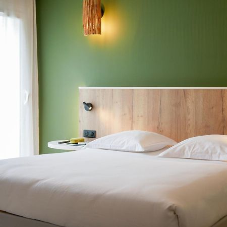 Best Western Le Bois De La Marche Лигуже Экстерьер фото